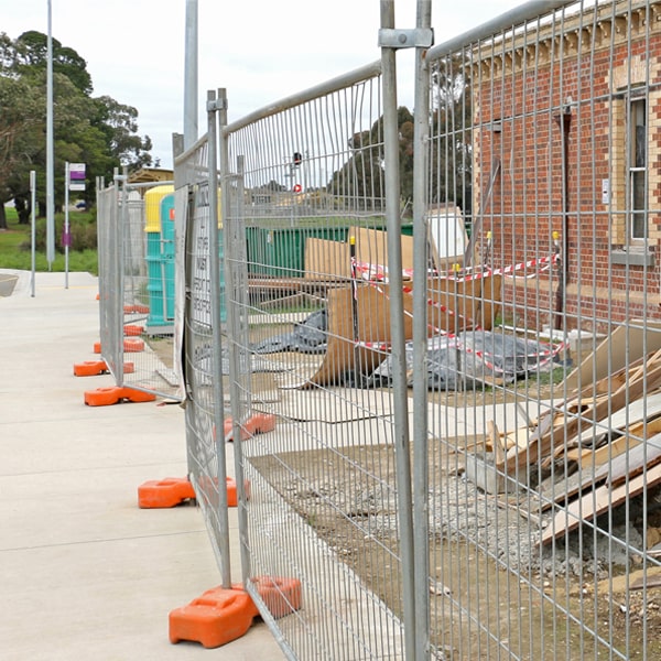 what's the process for scheduling the removal of the temporary fence once my job or even is completed